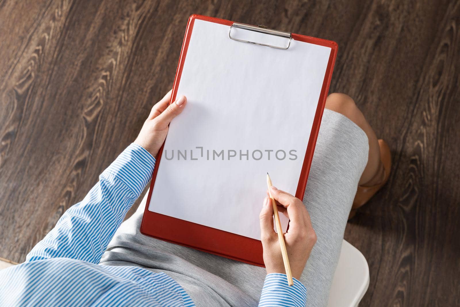 close-up a female hands with tablet and pencil