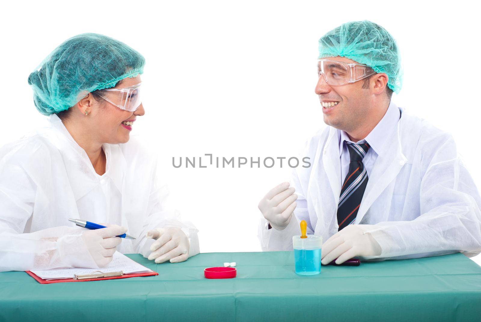 Two laboratory people having conversation and smiling together