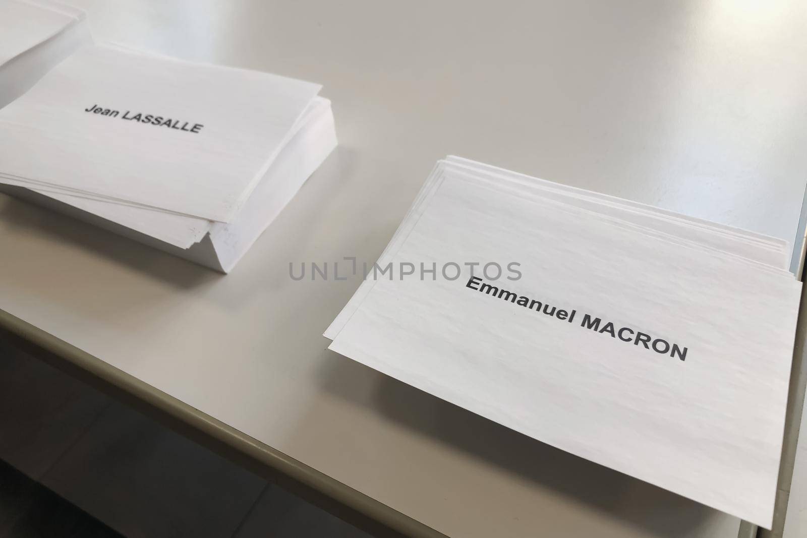 PARIS, FRANCE - APRIL 10, 2022 :Ballots with the names of candidates for elections in France
