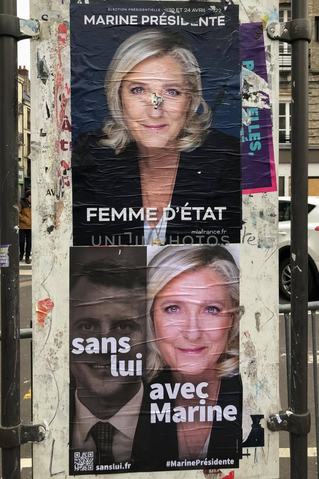 PARIS, FRANCE - APRIL 13, 2022 : The banners with candidates for President elections