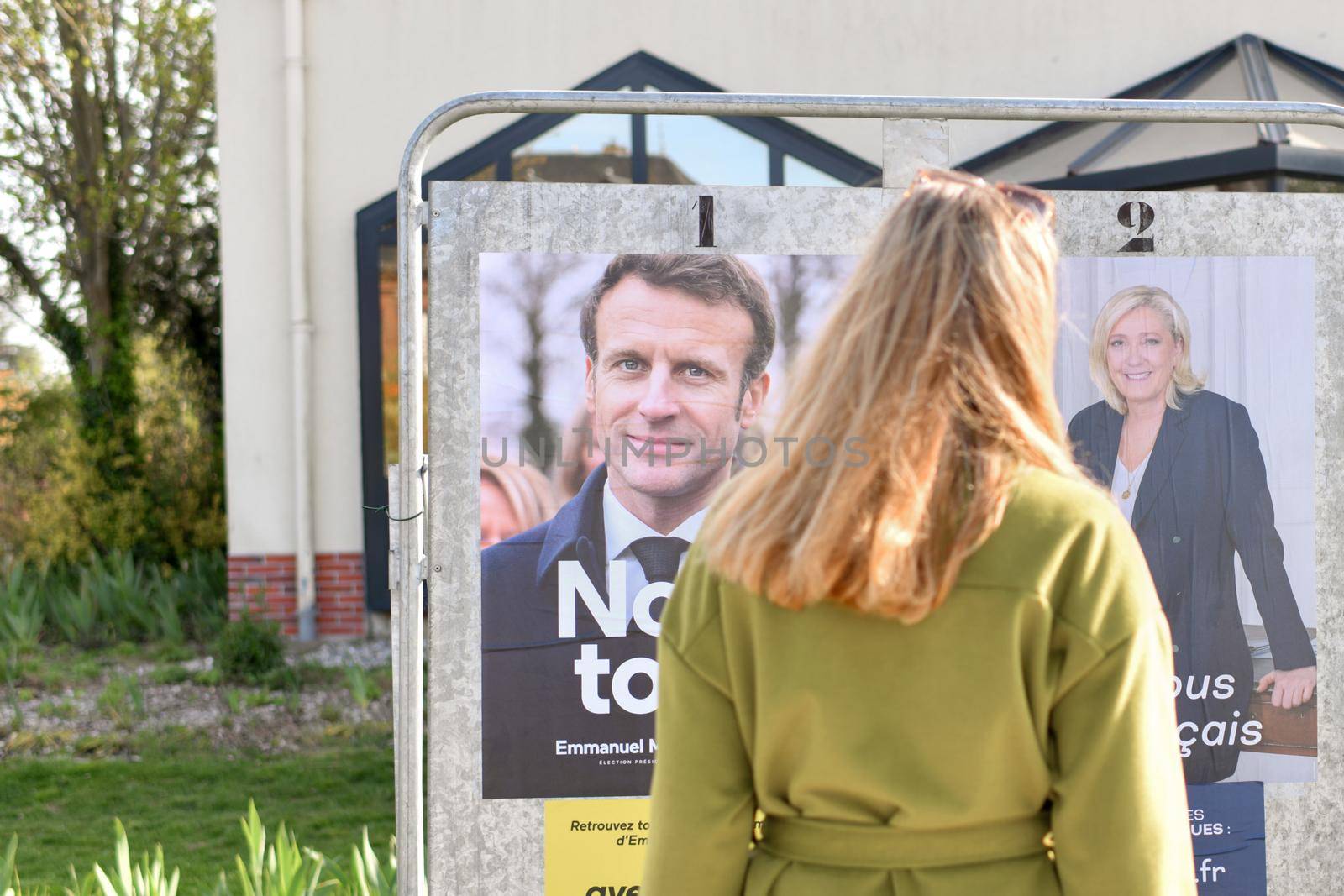 PARIS, FRANCE - APRIL 20, 2022 : The banners with candidates for President elections