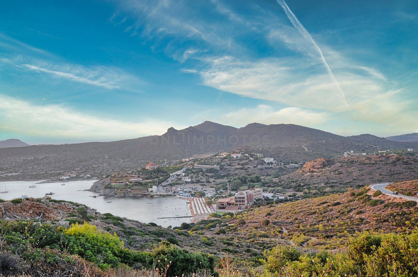 the ancient temple of Poseidon . Cape Sounion , located 69 kilometers of Athens , Greece . The site is a popular day-excursion for tourists from Athens