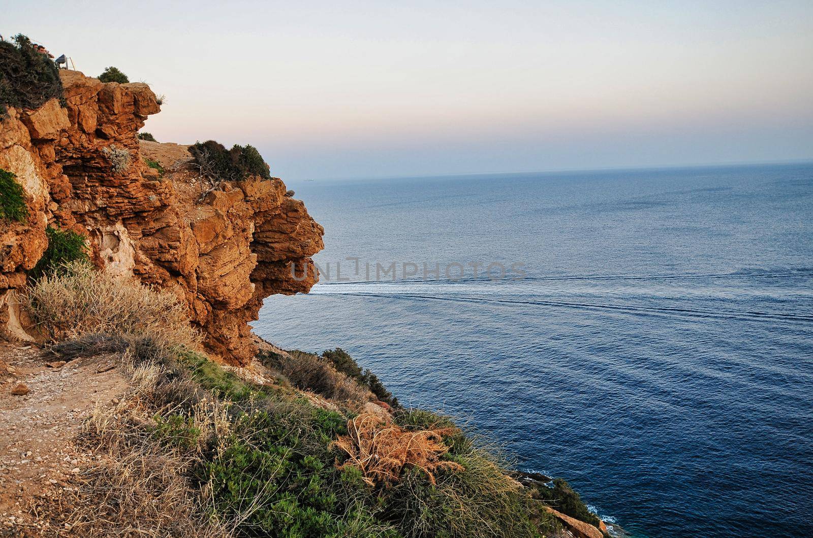 View of the blue sea from Temple of Poseidon, by feelmytravel