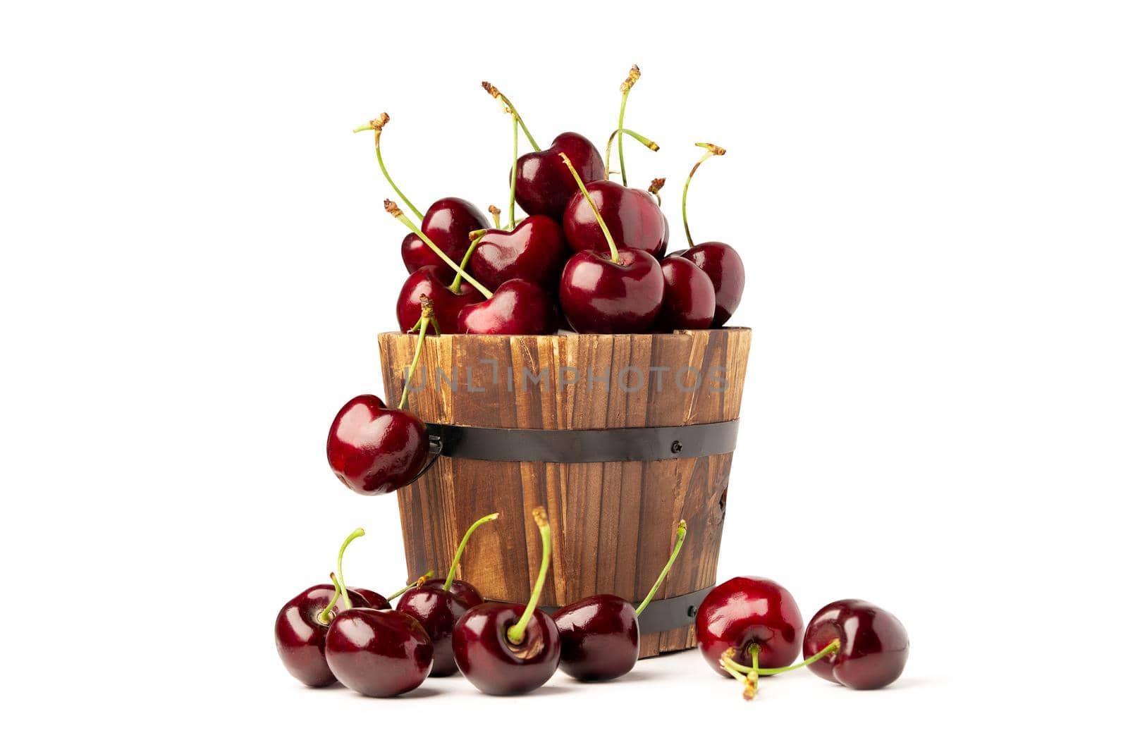 Berry Cherry in wooden round barrel pot on white background.