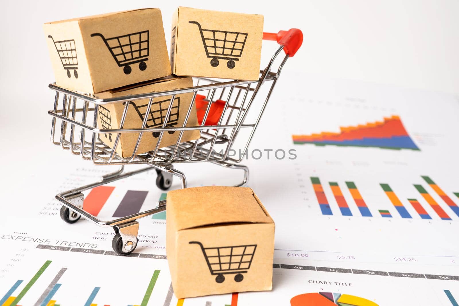 Shopping cart logo on box with graph background. Banking Account, Investment Analytic research data economy, trading, Business import export transportation online company concept. by pamai