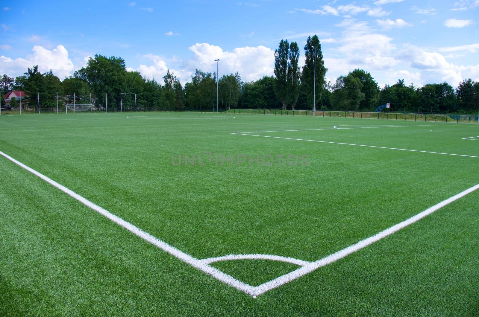 White line  corner on green football field by rdonar2