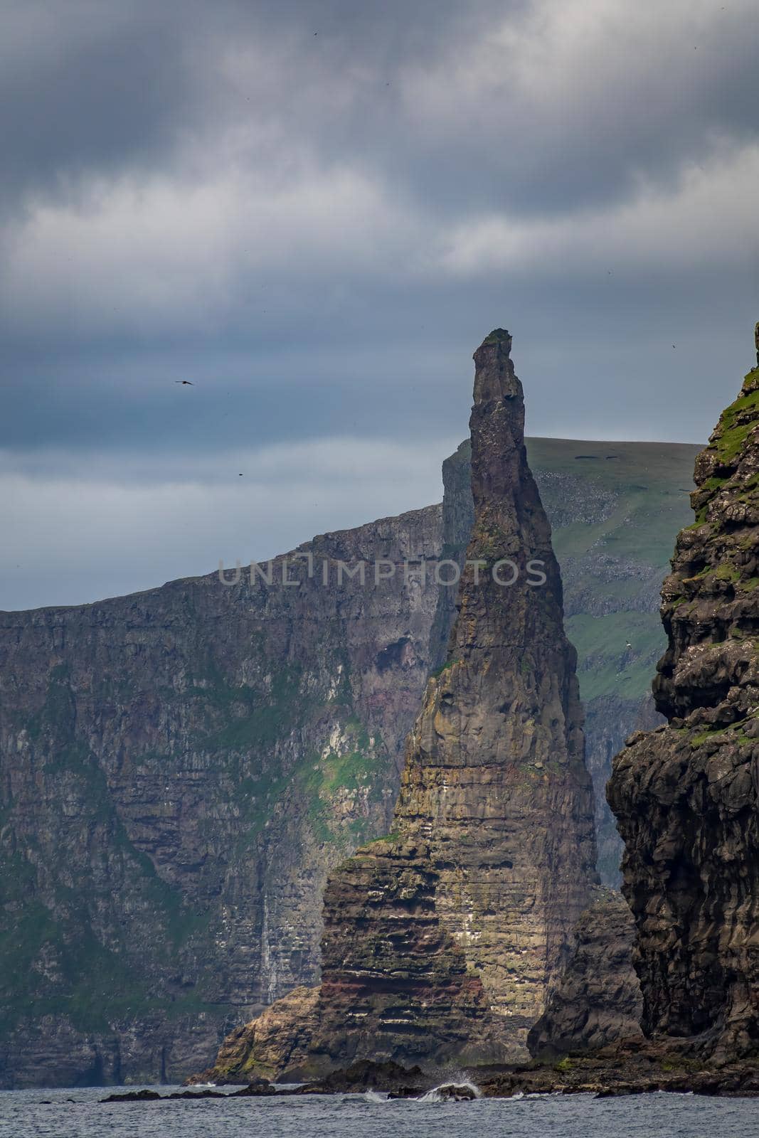 Needle cliffs in the steep coastline, Faroe Islands by FerradalFCG