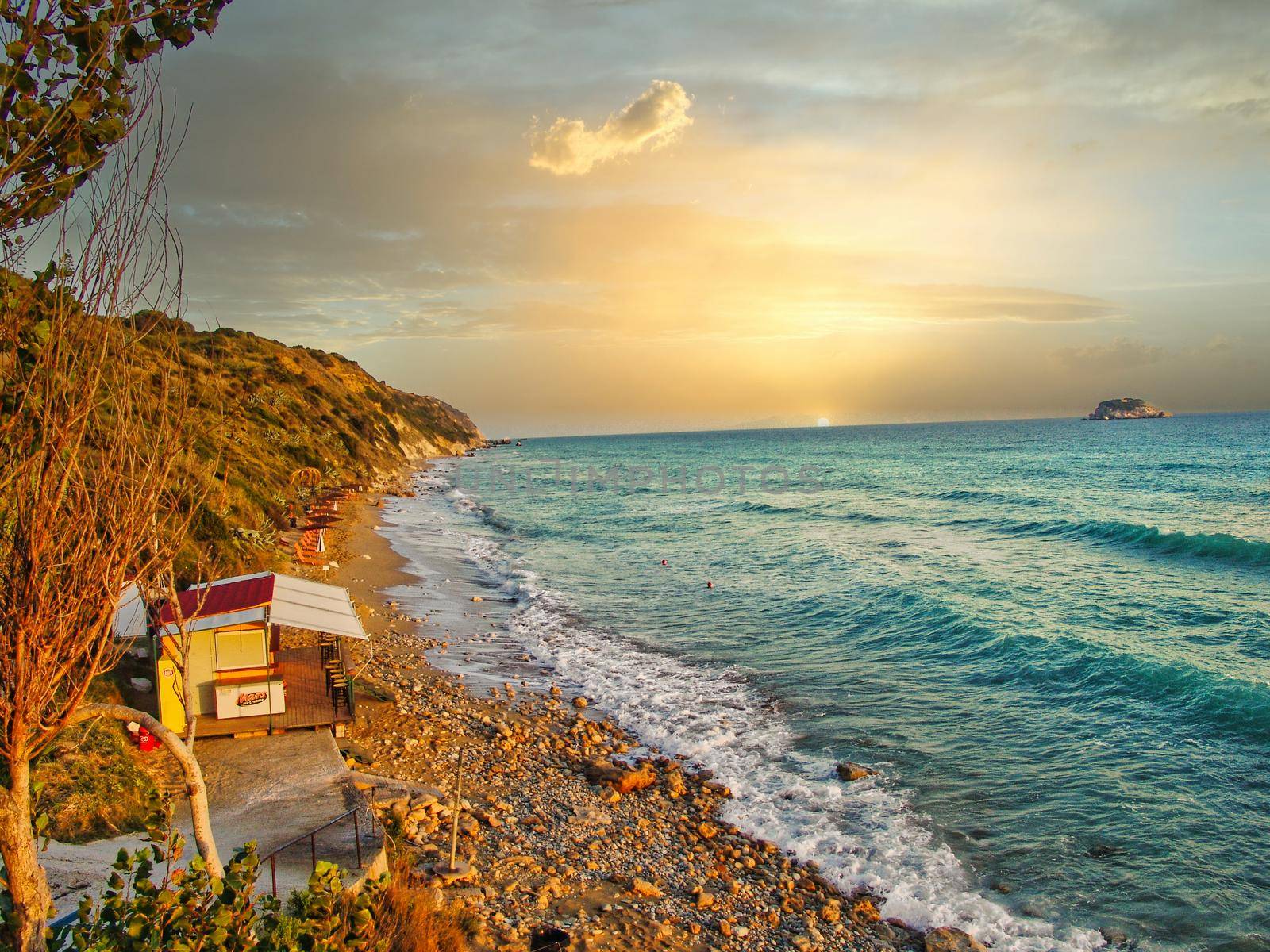 Beautiful colorful sunset at famous beach on Kefalonia Island. Ionian sea, Greece.