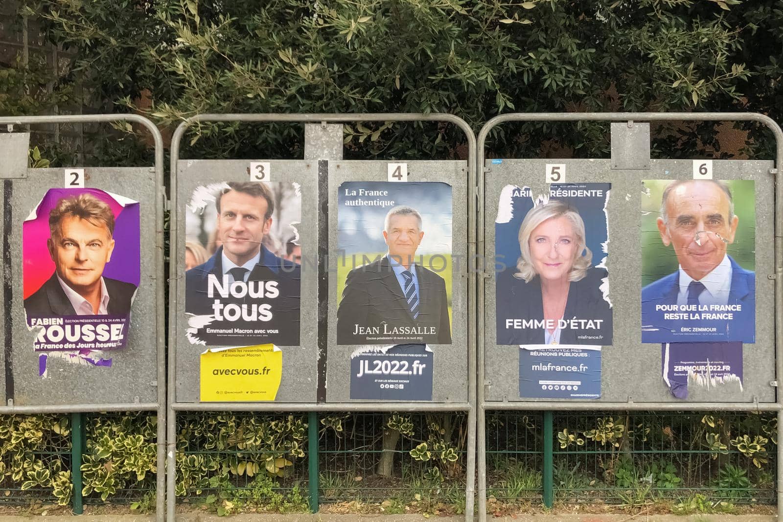 PARIS, FRANCE - APRIL 06, 2022 : The banners with candidates for President elections