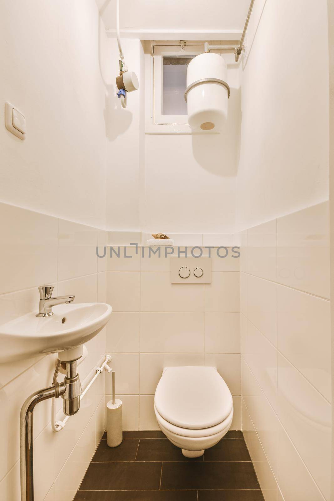 Lavatory with toilet and sink by casamedia