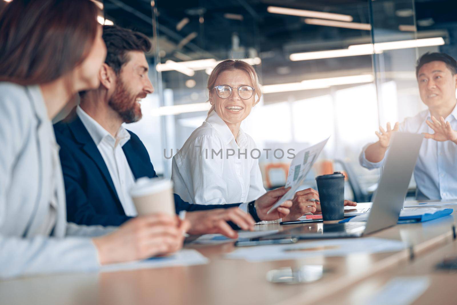 Group of modern, Lawyers, Businesspeople and Investors Gather at the Table in Corporate Meeting Room by Yaroslav_astakhov