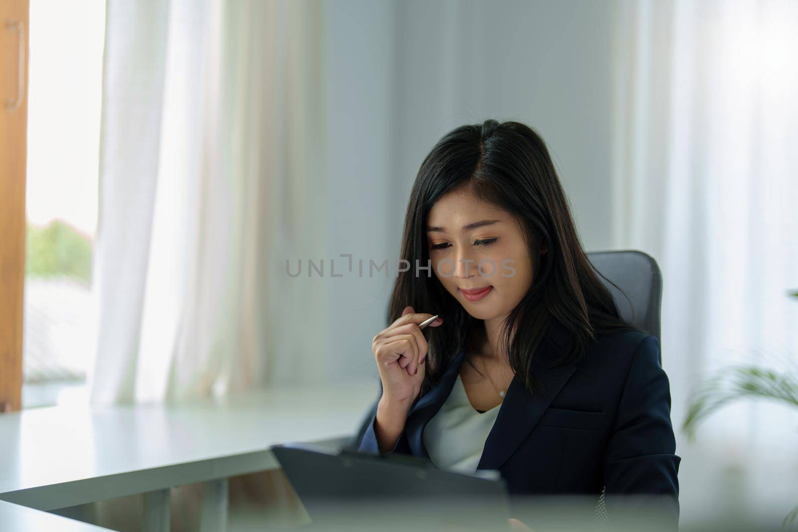 data analysis, plan, marketing, accounting, audit, Portrait of asian business woman planning marketing using computer and statistical data sheet to present marketing plan project at meeting. by Manastrong
