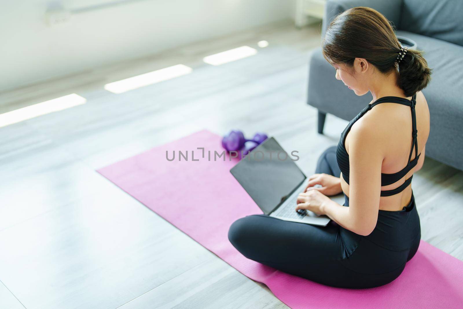 stress relief, muscle relaxation, breathing exercises, exercise, meditation, Young Asian woman relaxing her body from office work by practicing yoga by watching online tutorials. by Manastrong