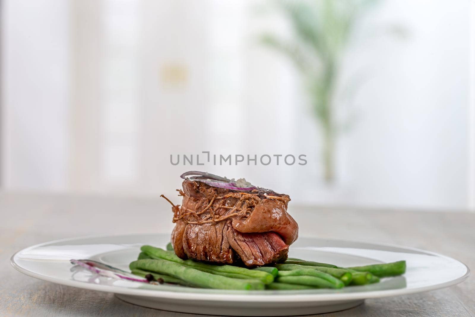 Grilled tournedos with asparagus and spinach vegetables minimalist photo, by JPC-PROD