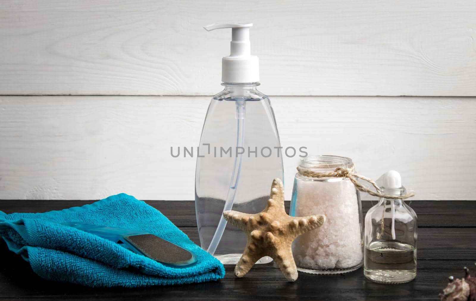 Foot care and cosmetics. Pedicure accessories set: pumice, towel, sea salt. Various bath accessories. Items for the spa. Still life. Copy space