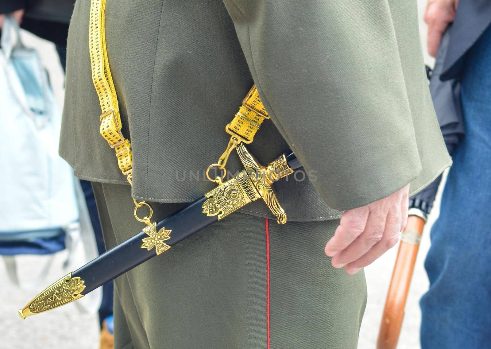 Soviet officer dagger in the hands of veteran in the second world war Military uniform