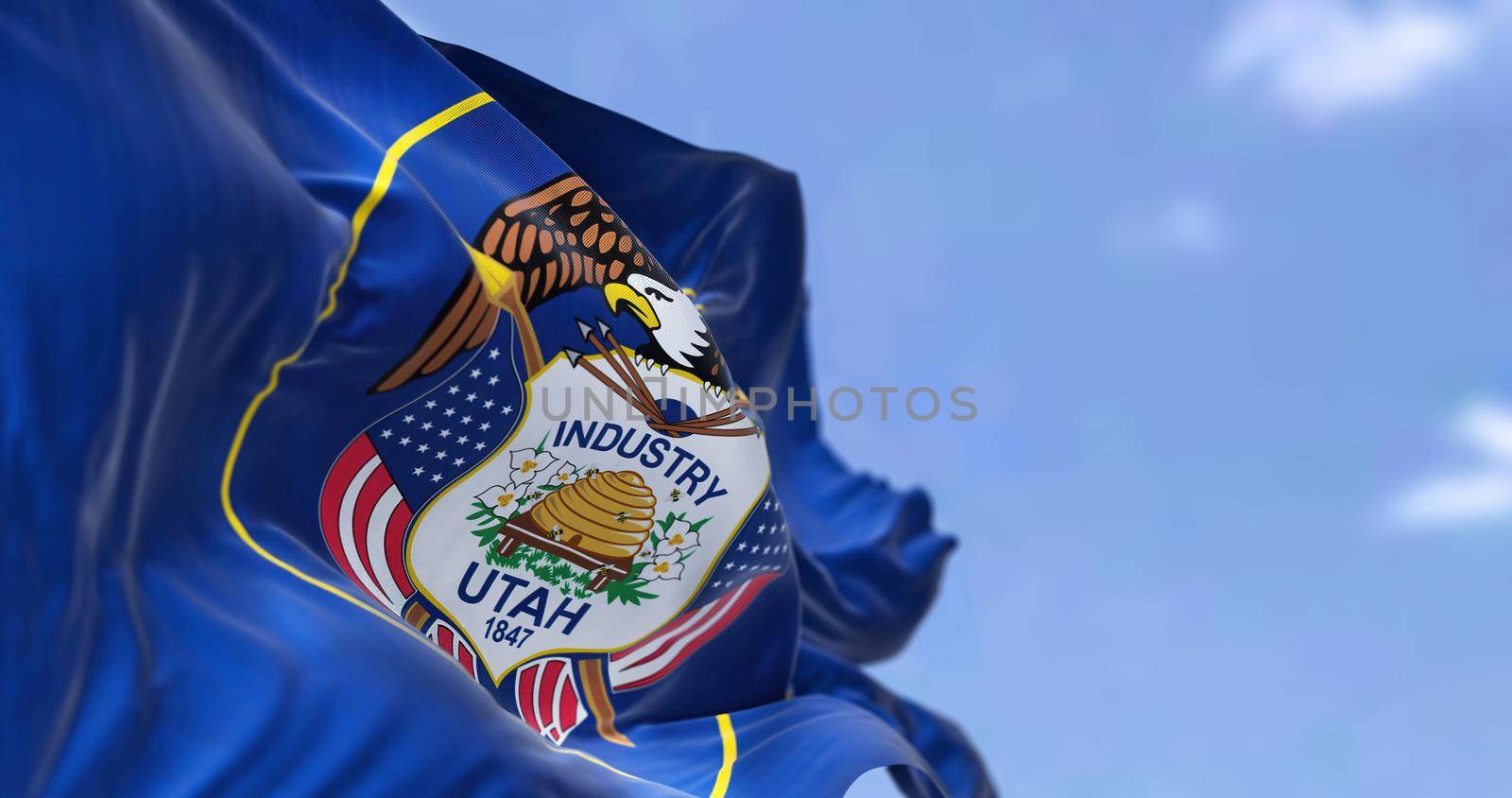 The US state flag of Utah waving in the wind by rarrarorro