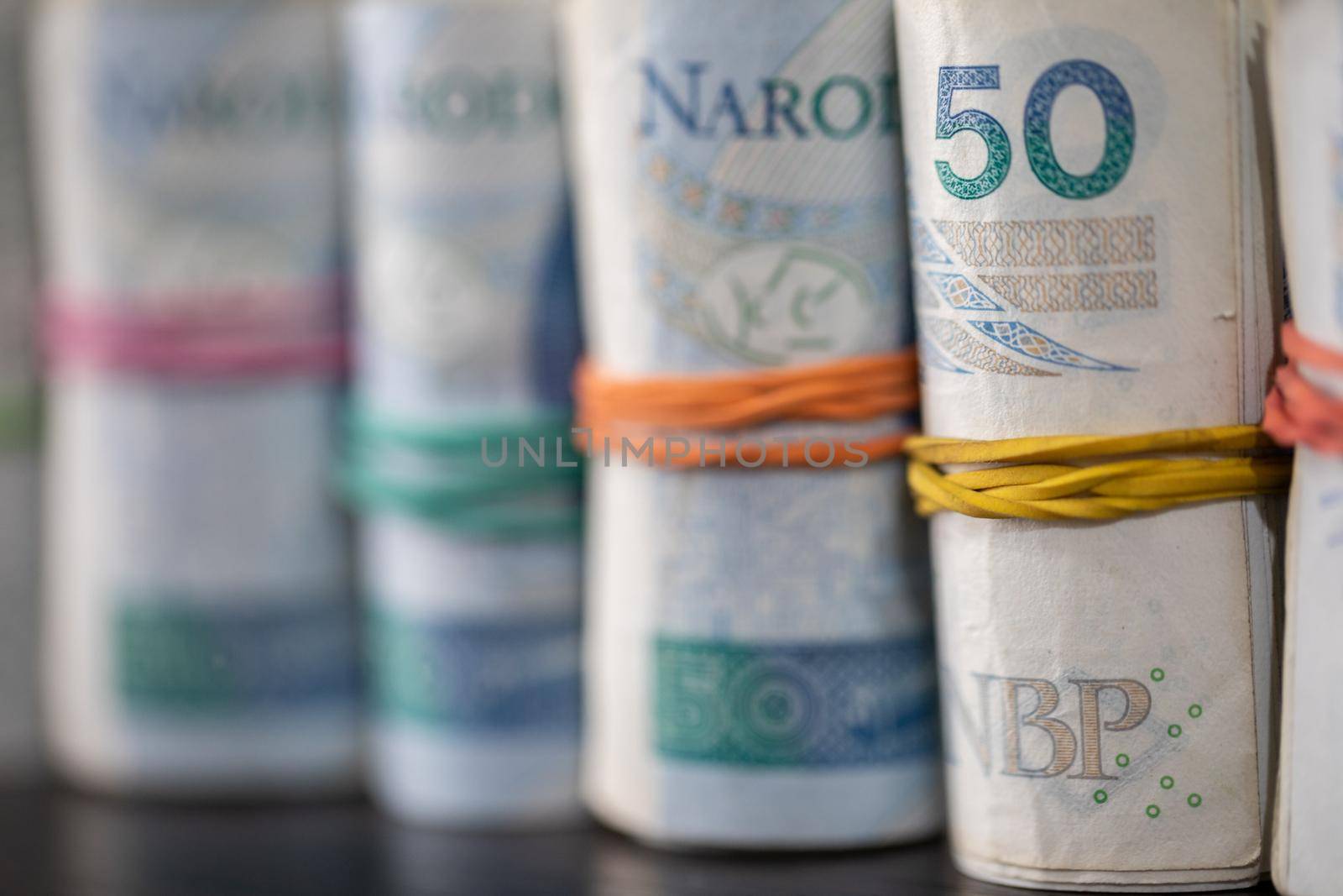The first plan with a few rolls of paper cash and the second plan gradually blurred.