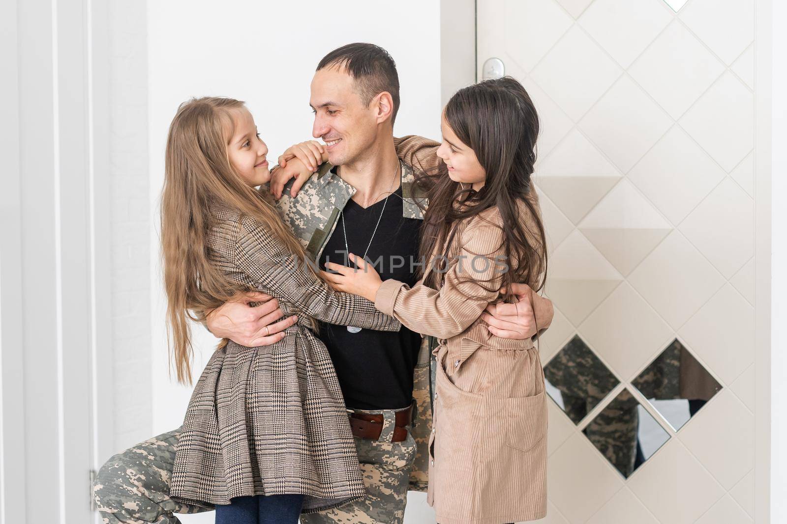 Military father with his family at home.