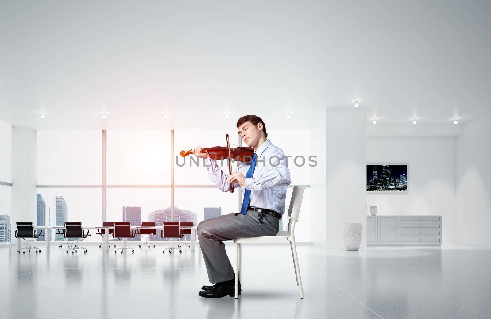 young businessman is engaged in music, business creativity concept