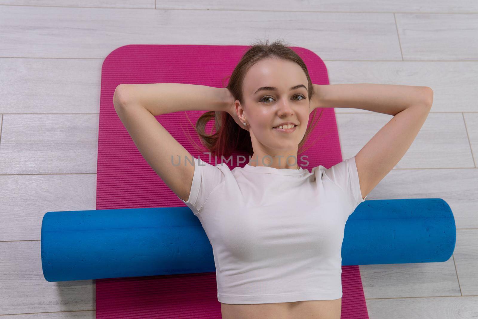 Roller the fitness mfr the on lies girl red mat mfr sportswear, from fit class for active from yoga body, stretching motivation. Gymnastics copy gym, smiling pose by 89167702191