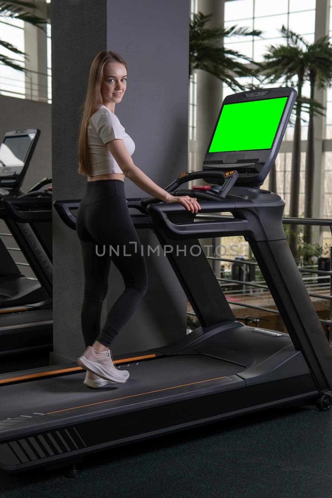 Young length woman indoors treadmill profile full exercise female, concept healthy lifestyle workout attractive for person and training sporty, muscles athletic. White legs group,