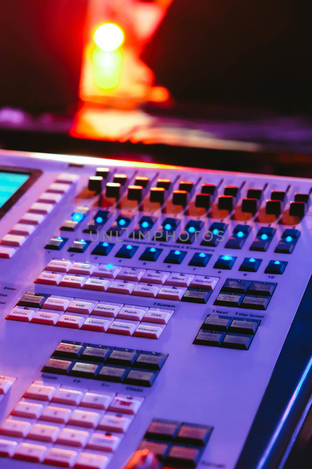 Closeup of an audio mixing control panel