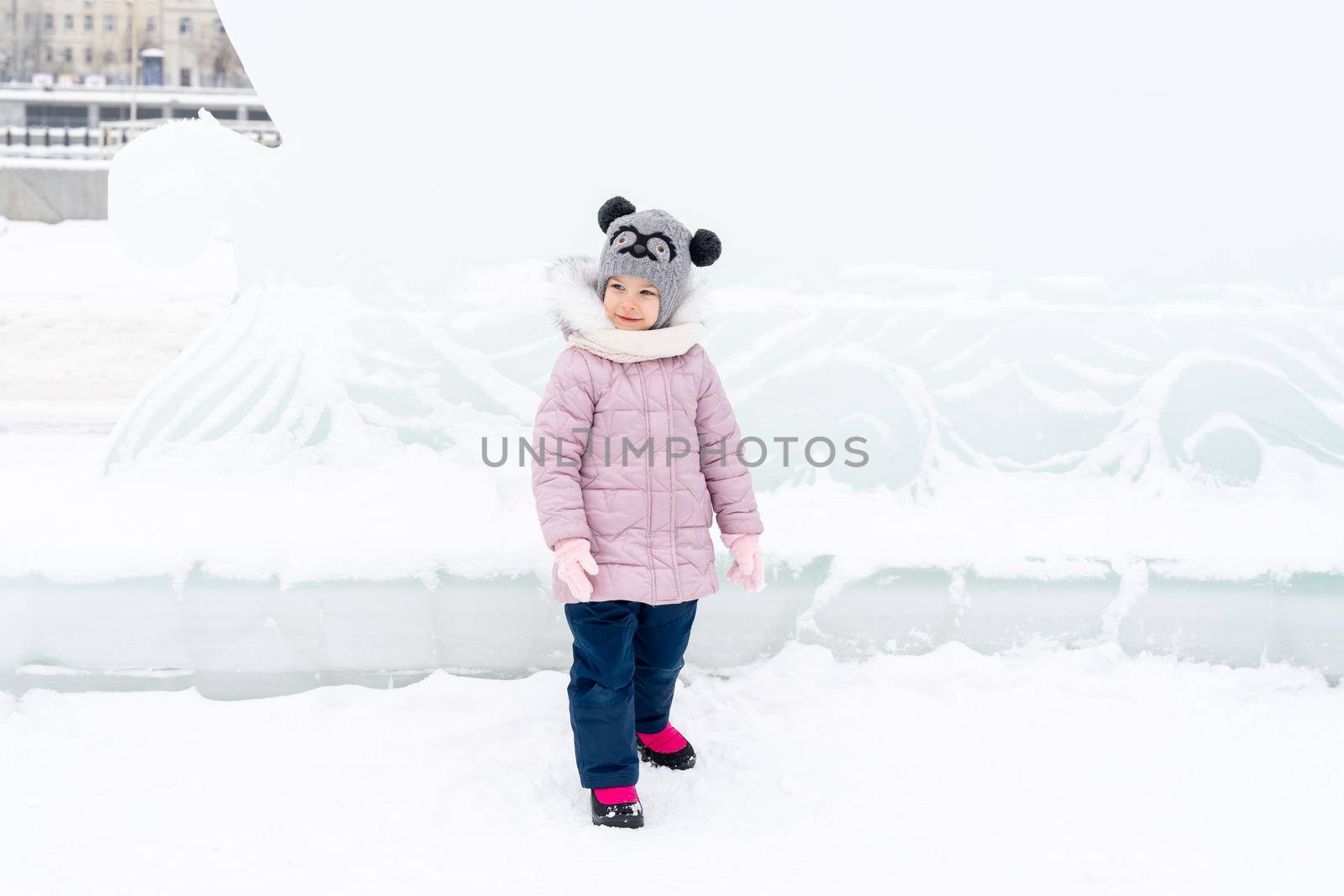 cute little caucasian girl with ice sculptures by Lena_Ogurtsova