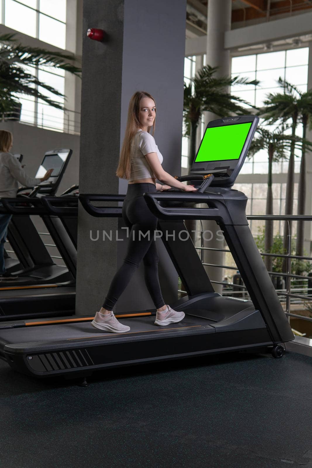 Indoors young treadmill woman length profile full running sport, from lifestyle healthy from person from adult sporty, muscles together. White run slim, friends by 89167702191