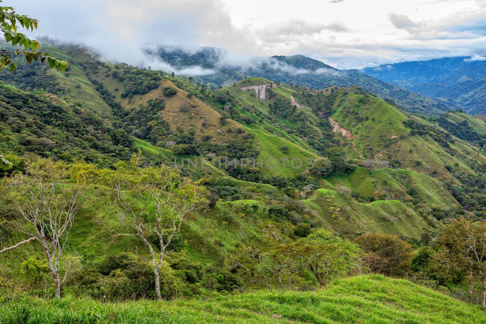 Beautiful view on the hills and forest surrounding Los Quetzales national park, beautiful Costa Rica Wilderness landscape