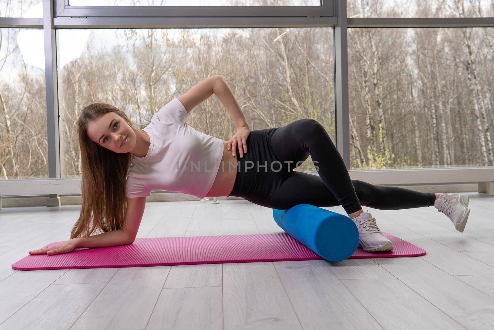 Girl the on lies mfr roller the fitness red mat window strength, for fit cheerful in female for healthy person, pilates stretch. Plank copy leg, practicing pose