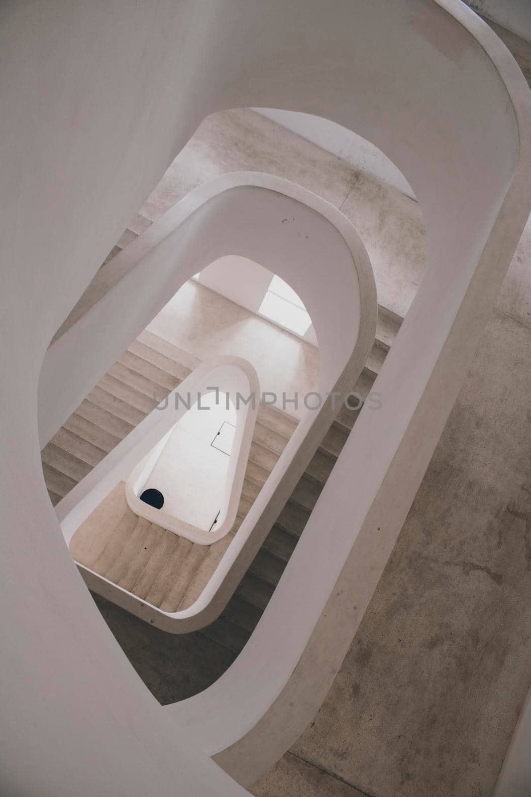 Modern white interior staircase from above