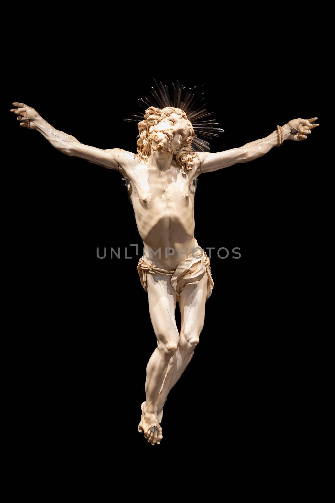 Jesus Christ - Old crucifix, Catholic Church, on black background with copy space