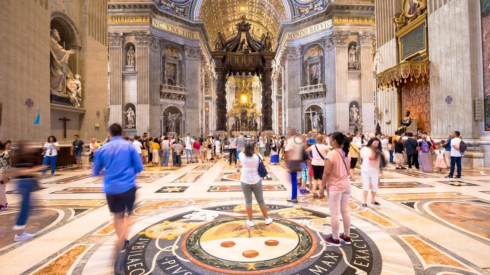 ROME, VATICAN STATE - August 24, 2018: interior of Saint Peter Basilica with mass-tourism arrival