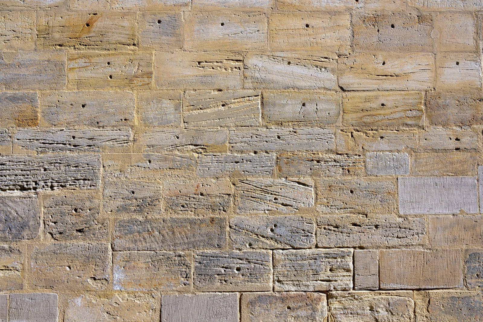 Background from an old wall made of natural stone