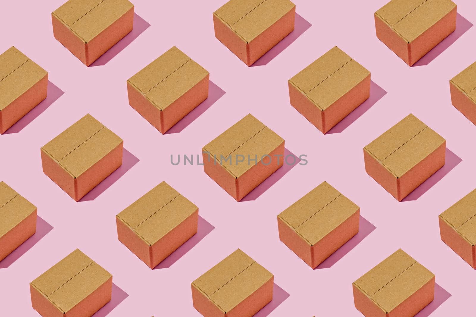 Background pattern with brown delivery boxes on magenta background. Minimal logistics concept.