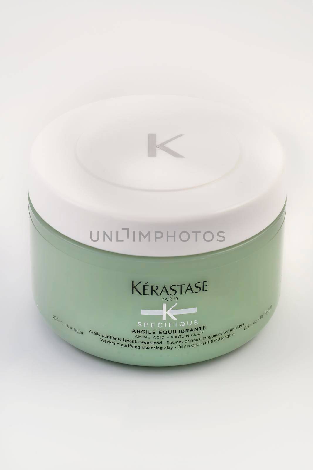 Thessaloniki, Greece - October 26 2022: Kerastase Paris Specifique Argile Equilibrante hair detox clay amino acid shampoo on 250 ml container that cleanses and purifies the scalp, on white background.