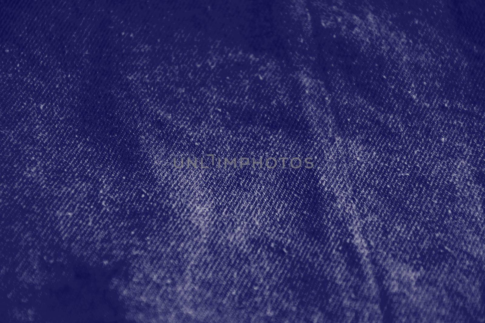 Very peri toned colour monochrome texture knitted fabric. Lavander knitted Jersey as textile background. Monochrome color background. Wool knitting texture. Trendy color 2022. . High quality photo
