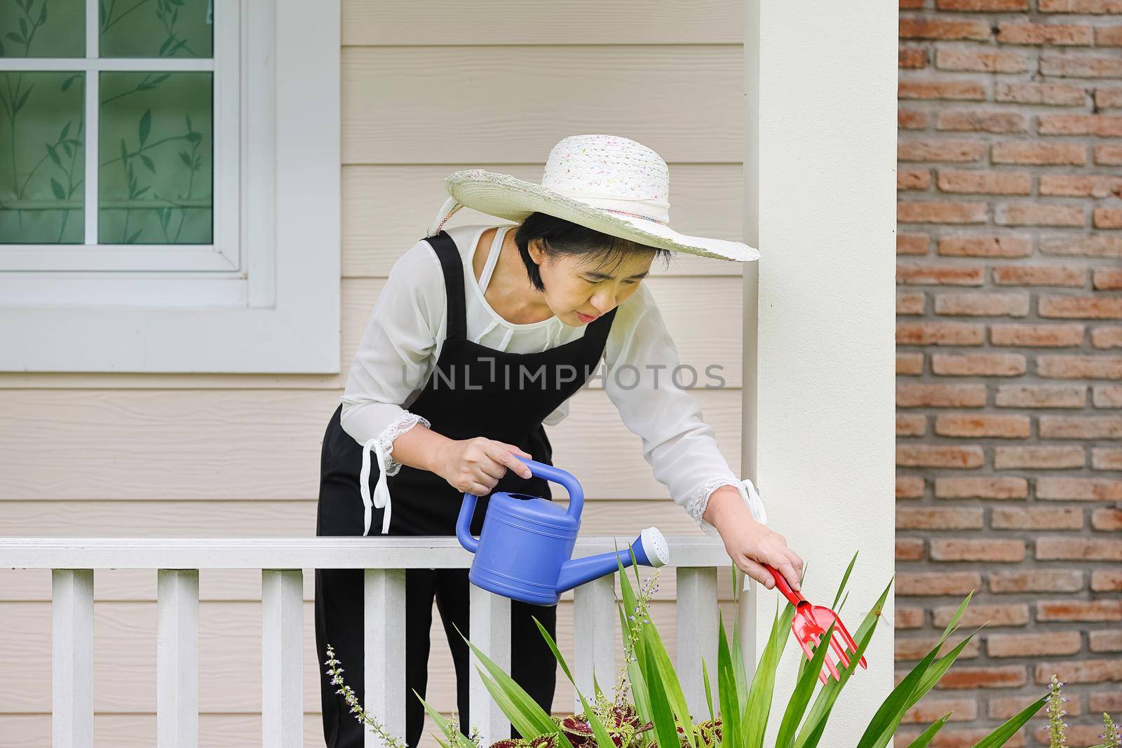 woman relax with gardening in backyard