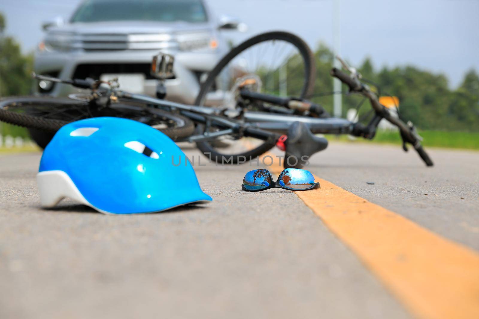 Accident car crash with bicycle on road