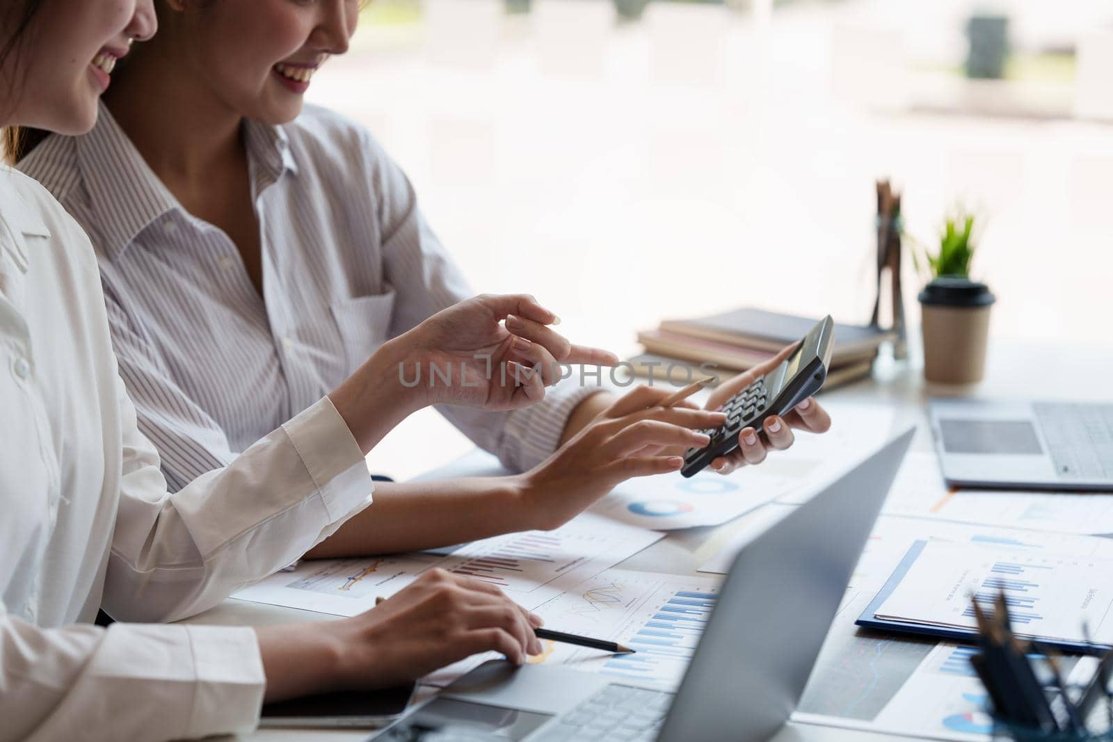 Group of Business people and Accountant checking data document on digital tablet for investigation of corruption account. Anti Bribery concept. by itchaznong