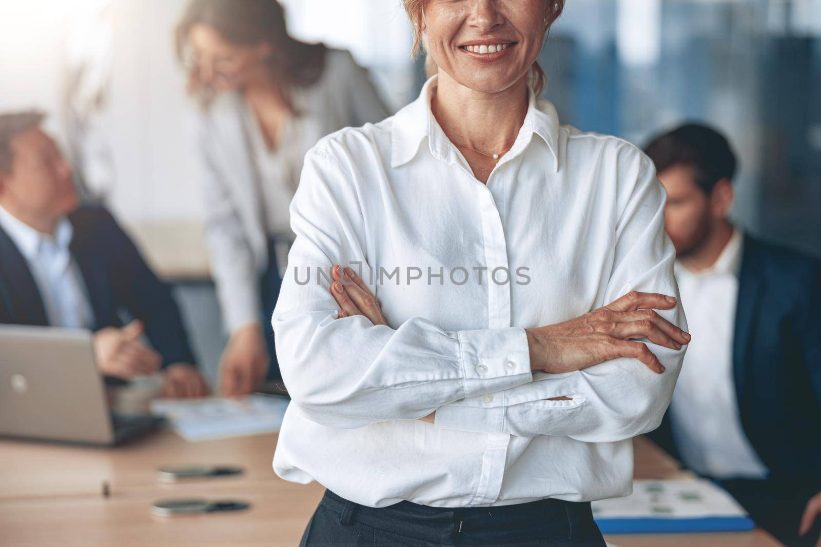 Close up of Portrait of beautiful mature confident business woman looking straight