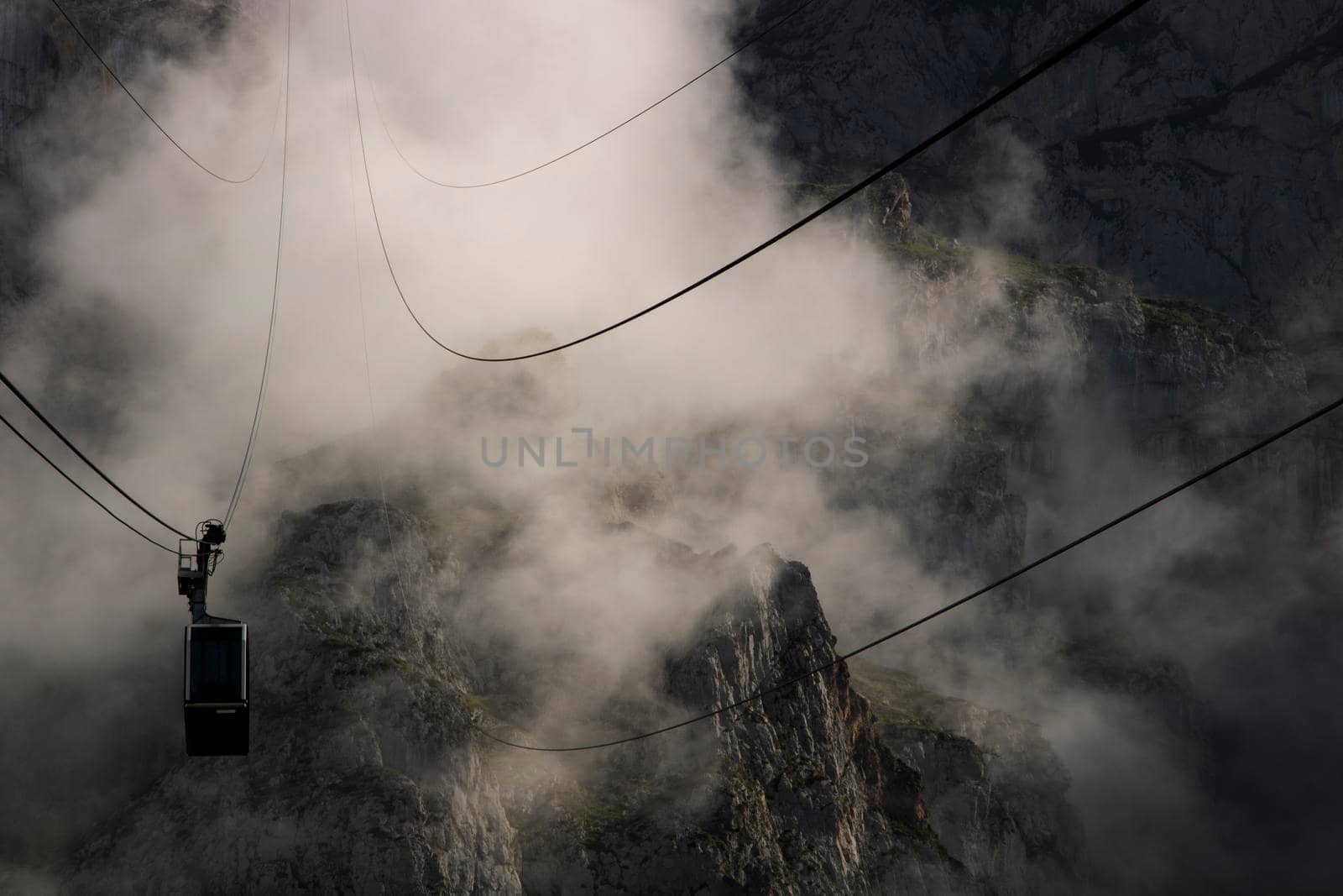 Cable car among the fog in Fuente De by ValentimePix