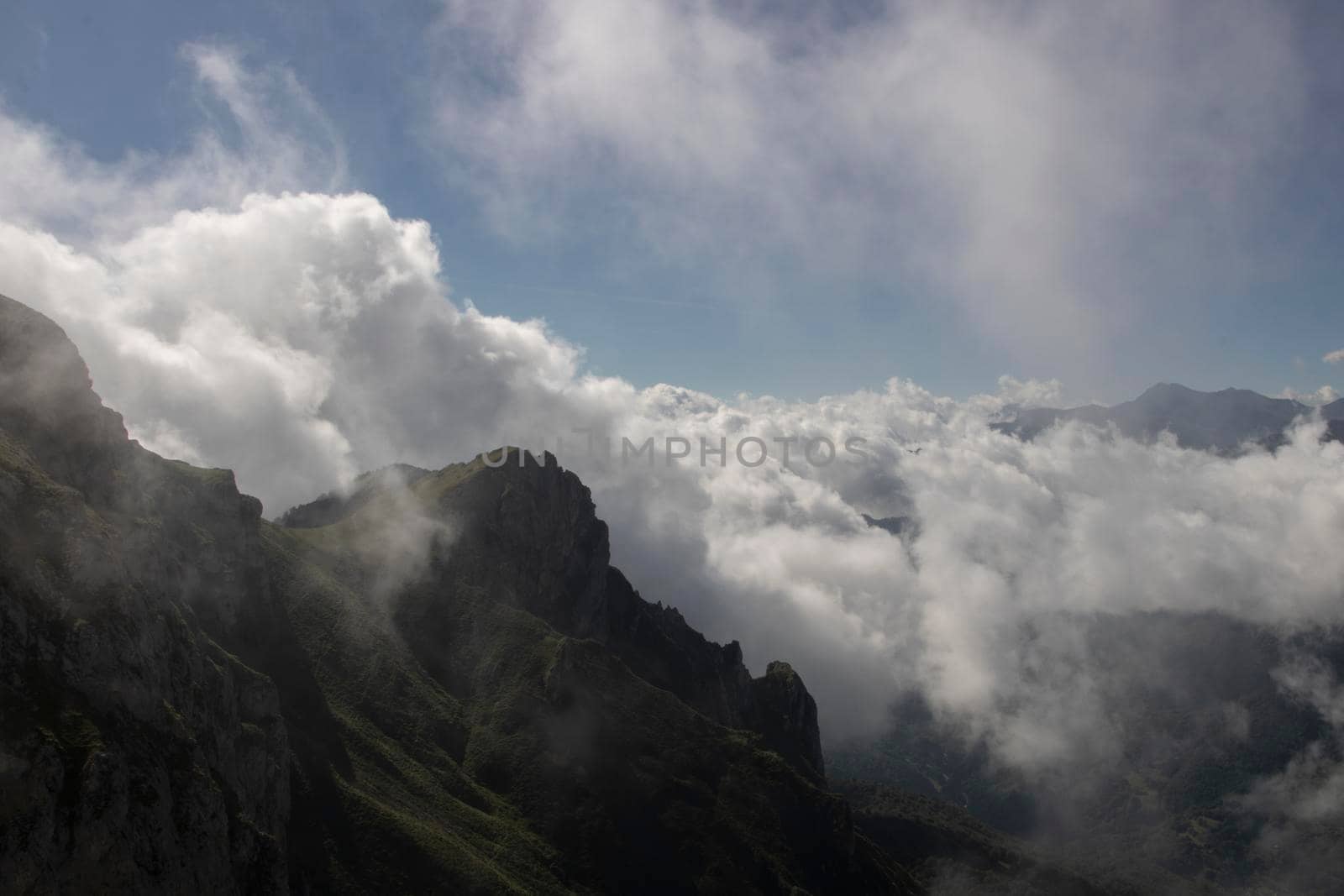 Cloudy high mountains by ValentimePix