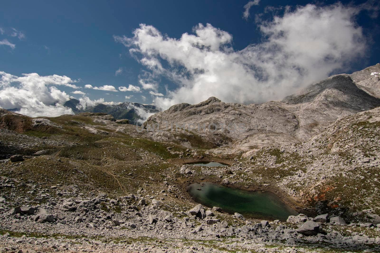 Landscape showing high mountain and a lake in Fuente Dé, a place in Picos de Europa National Park in Spain