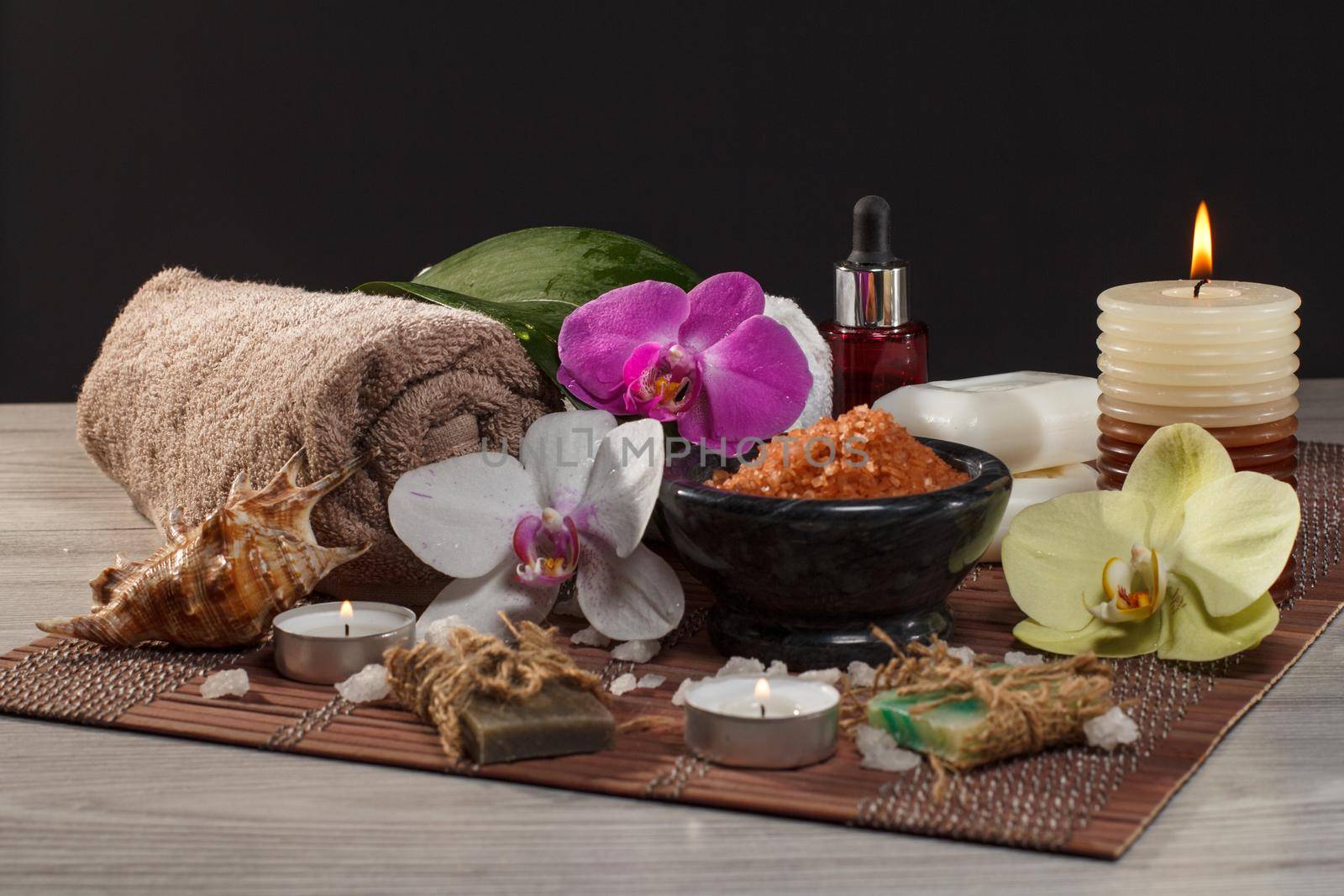 Spa and wellness accessories on wooden background by mvg6894