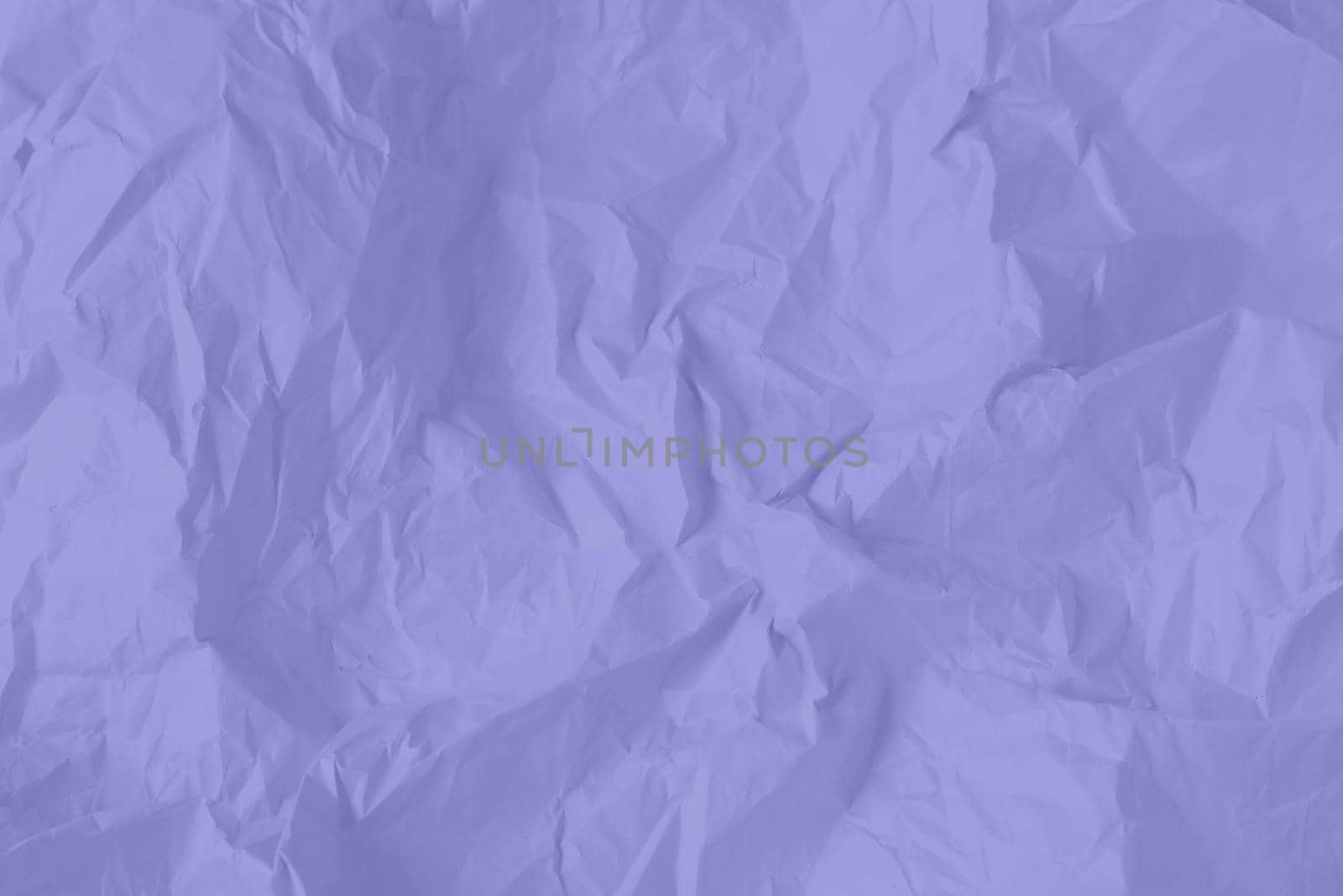 Crumpled paper Very Peri color of the year 2022. Texture crumpled paper for your design. Copy space. Very Peri color paper. by kizuneko