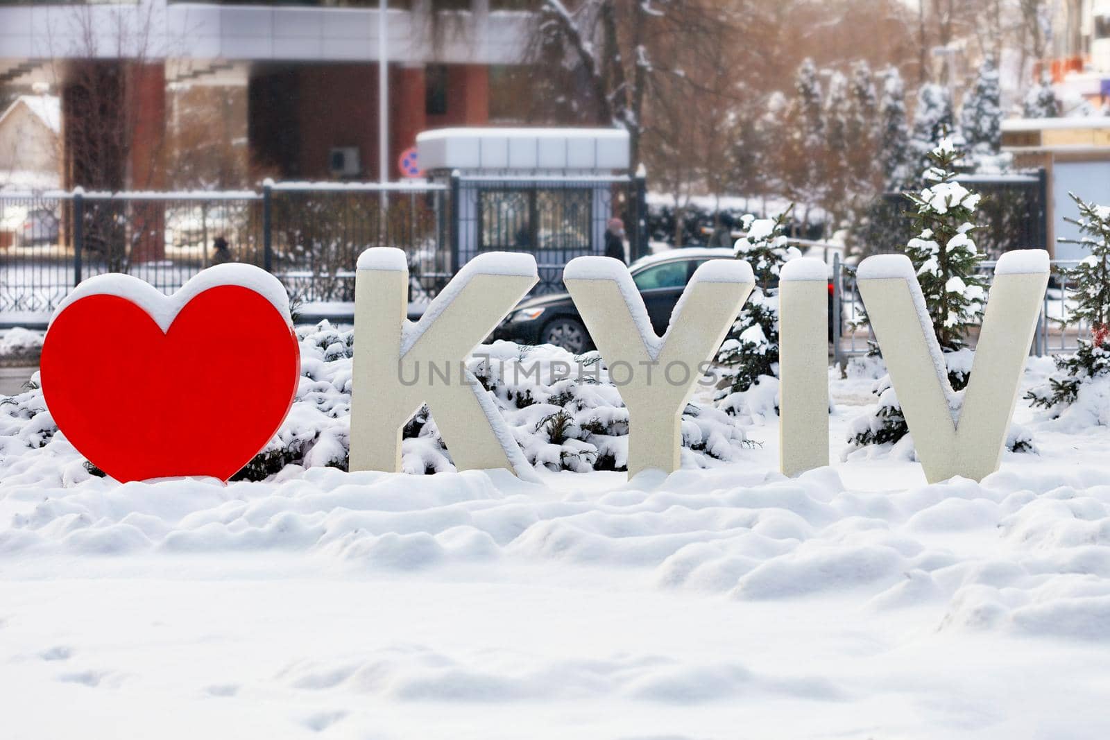 The inscription "I love Kyiv" in the city park under a cap of snow in winter. Kyiv, Ukraine. 16.01.2021. by Sergii