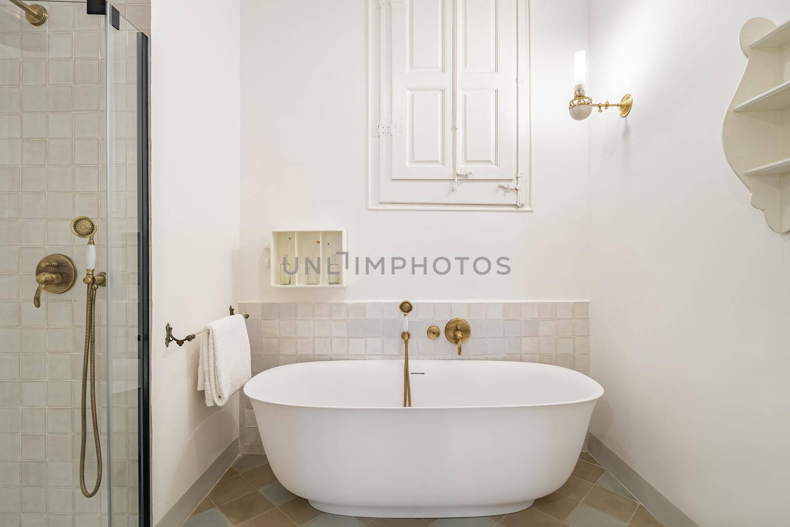 Retro style bathroom decorated in white color with bathtub and shower zone. by apavlin