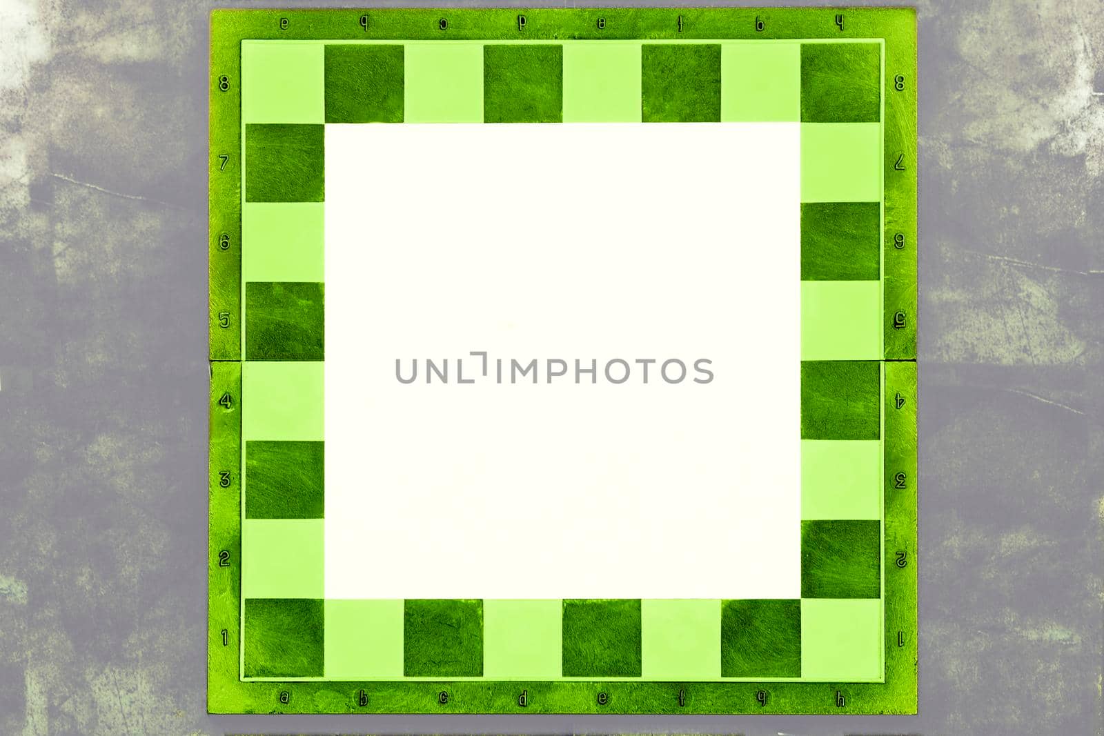 Green chessboard on a gray background with space for text by jovani68